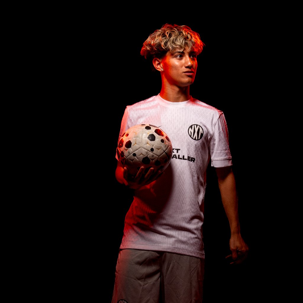 NXT footballer holding ball