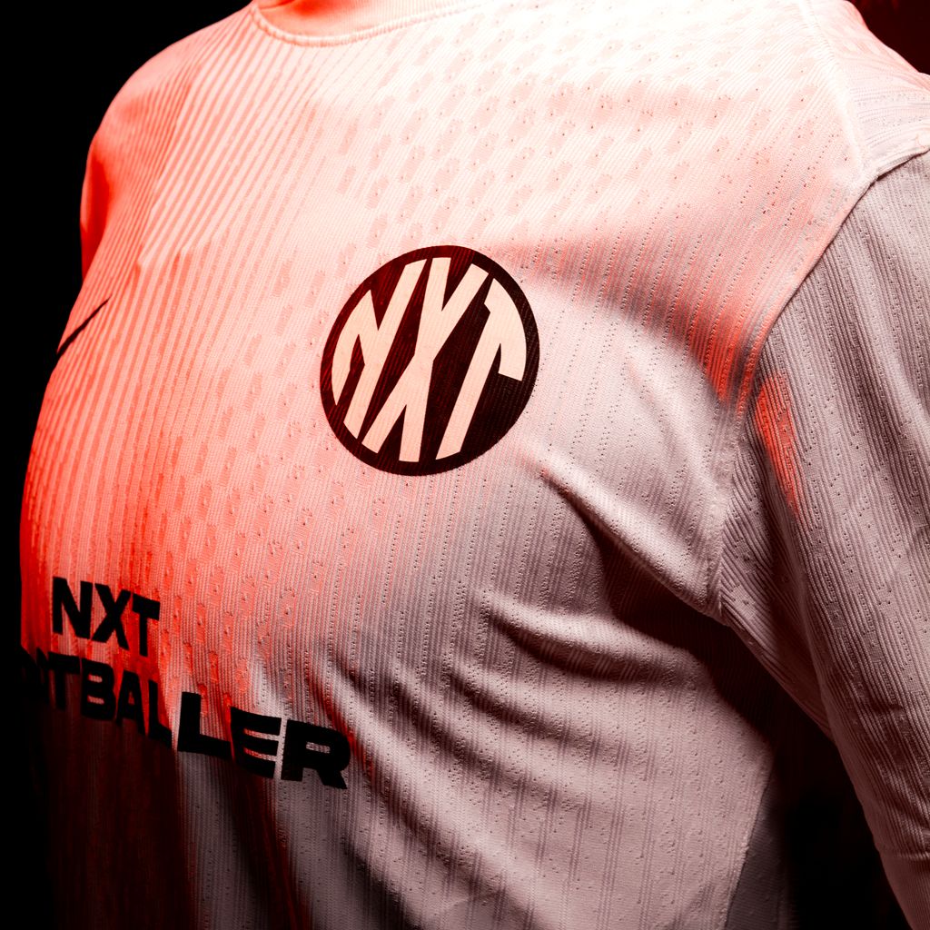 NXT footballer chest with logo