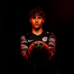 NXT football goalie holding football