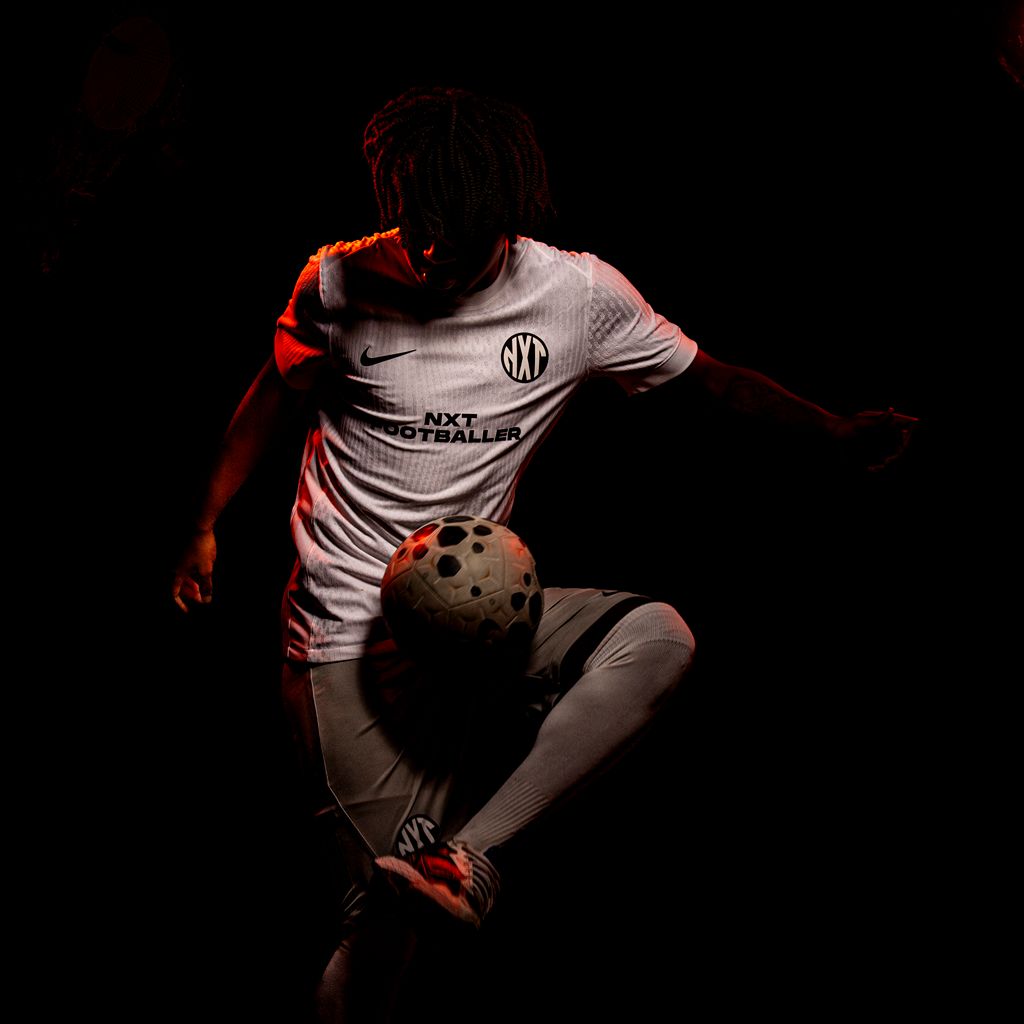 NXT footballer kicking ball up