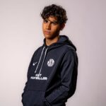 NXT footballer in hoodie