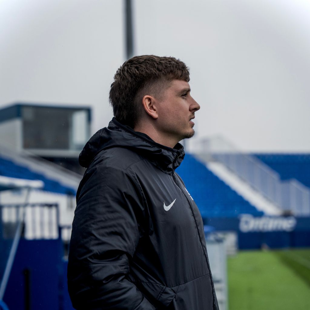 NXT football founder looking at pitch